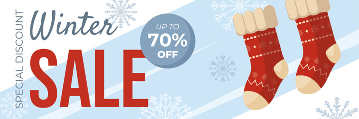 Winter sale vector banner with festive red Christmas socks and decorative snowflakes on blue background. Seasonal holiday design template for discounts, shopping promotions, advertising and marketing.