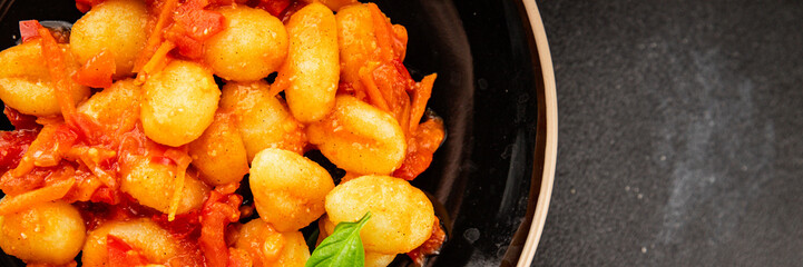 Gnocchi tomato sauce fresh delicious gourmet food background on the table  rustic food top view copy space