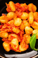 Gnocchi tomato sauce fresh delicious gourmet food background on the table  rustic food top view copy space