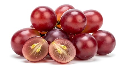 Fresh red grapes with sliced halves on white background