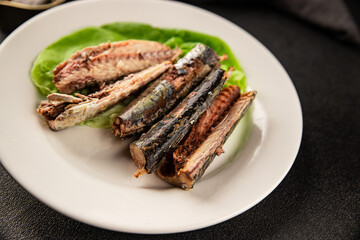 Sardine canned food sprats fish seafood fresh pescetarian diet gourmet food background on the table rustic food top view copy space keto and paleo diet