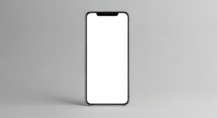 Modern smartphone with a blank white screen standing upright on a clean gray background for mockup.