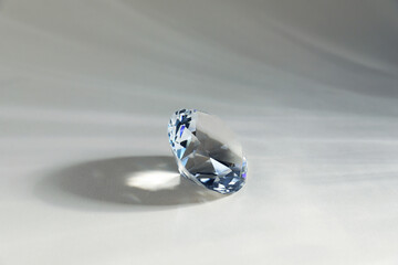 Aura. One beautiful diamond on light background