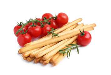Delicious grissini sticks with fresh tomatoes and rosemary isolated on white