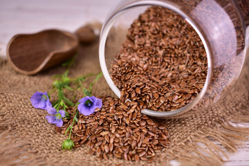 Flax seeds in a glass jar. Close-up. Superfood.
