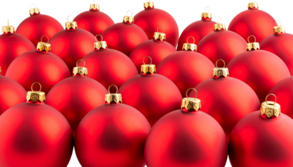 Shiny red glass Christmas baubles and golden ornaments on a white background