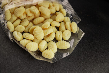Gnocchi raw potato dough snack fresh delicious gourmet food background on the table  rustic food top view copy space vegetarian food