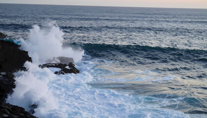 Ocean waves crashing on rocks