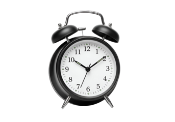 Classic black and white alarm clock with twin bells on a solid black background