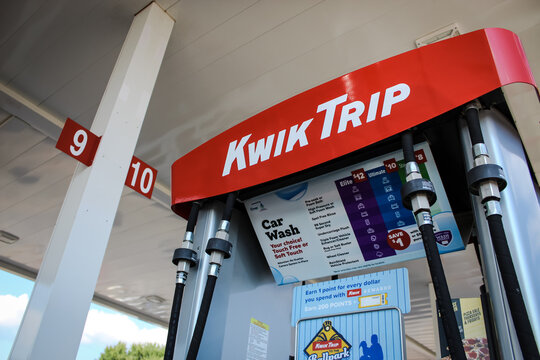 Thorp, WI (USA) - August 13, 2025: Closeup of a Kwik Trip convenience store gas pump with car wash sign on a beautiful day. Editorial Use Only.