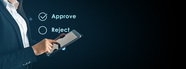 Businesswoman using digital tablet to approve option on modern interface screen in abstract...