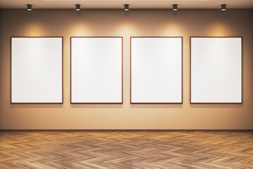 Contemporary gallery room with four vertical blank frames on beige wall and wooden parquet floor...