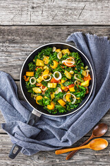 zucchini kale tomato saute sprinkled with sesame