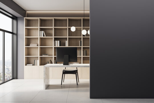 Modern corporate office interior with blank dark wall for mockup and stylish workspace featuring shelves, window, and desk setup. 3D Rendering - Powered by Adobe