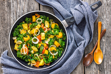 zucchini kale tomato saute sprinkled with sesame