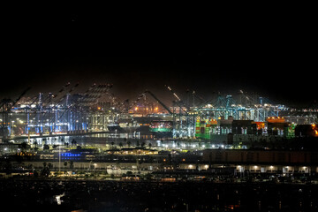 Fototapeta premium Night view of busy shipping port 