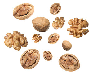 Walnuts swirling in air against white background