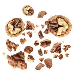 Walnuts swirling in air against white background