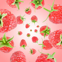 Fresh raspberries swirling in air against pink background