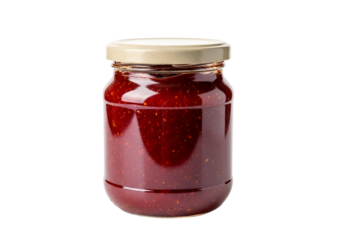 A clear glass jar, filled with a deep red, viscous substance, sits against a black background.