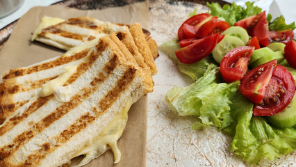 Serving cheese toast with salad