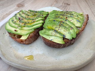 Deliciously simple avocado toast with herbs and spices