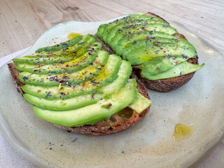Deliciously simple avocado toast with herbs and spices
