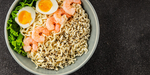 Noodles  shrimp and vegetables tasty seafood snack fresh delicious gourmet food background on the table rustic food top view copy space vegetarian food