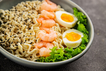 Noodles  shrimp and vegetables tasty seafood snack fresh delicious gourmet food background on the table rustic food top view copy space vegetarian food