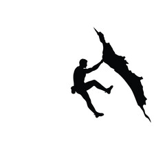 Silhouette of man climbing rock mountain