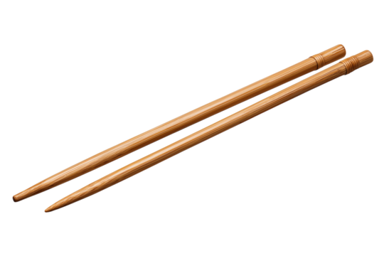 Pair of bamboo chopsticks on black asian food isolated on a transparent background