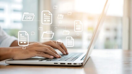 Person typing on a laptop with document and folder icons floating above the keyboard area shown