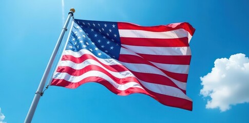 Low angle view, waving US flag, vibrant blue sky , stripes, textile, American flag