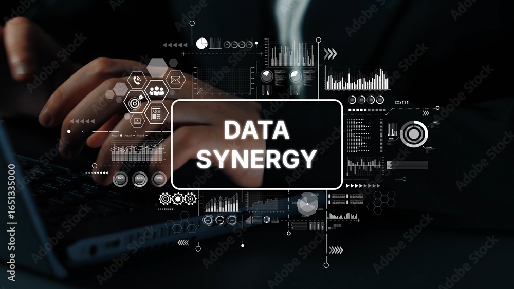 Poster hands on keyboard with digital overlays illustrating concept of data synergy in modern technology en