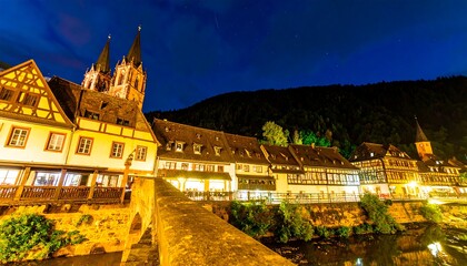 European town at night, illuminated buildings