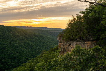 Obraz premium Sunset Over The Endless Wall And The Bridge In The Distance Of New River Gorge