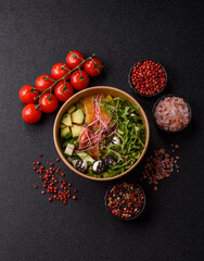 Bowl with salmon pieces, cheese, tomatoes, peppers and avocado. Salmon bowl