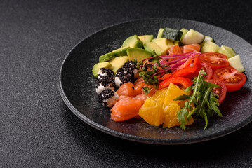 Bowl with salmon pieces, cheese, tomatoes, peppers and avocado. Salmon bowl