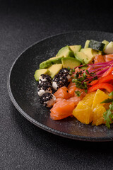 Bowl with salmon pieces, cheese, tomatoes, peppers and avocado. Salmon bowl