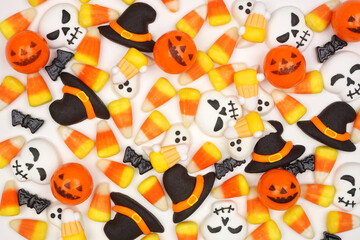 Halloween candy background. Overhead view against a white background.