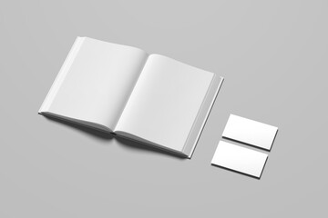 Blank business cards on light grey background, top view with Open magazine with blank page on grey background, top view. Mockup for design.