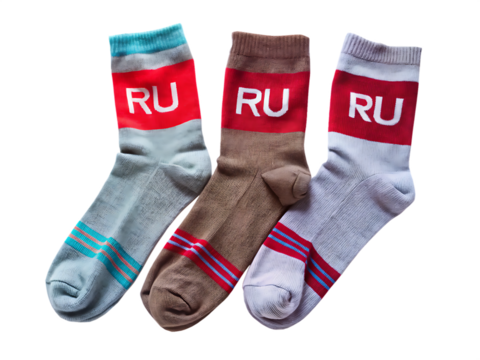three pairs of socks with ru isolated on white background ,PNG.AI Generated.