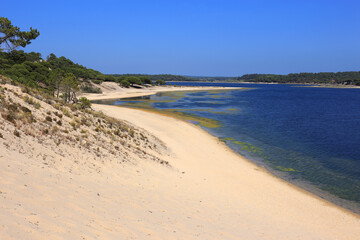 Portugal, Sesimbra, Lagoa de Albufeira - a coastal lagoon fed by 3 streams and the Atlantic Ocean. Bordered by aquatic vegetation and pine forests and protected from sea storms by sand dunes.