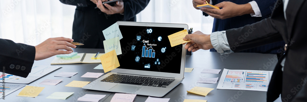 Poster cost reduction, cost saving concept shown on computer screen brisk, corporate business efficiently s