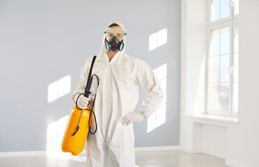 Pest exterminator, professional disinfection service worker standing posing, pest control for...