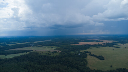 Aerial View of Serene Misty Landscape at Dawn with Vibrant Sunrise