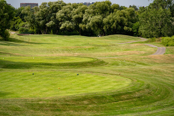 View of empty golf course landscape.
