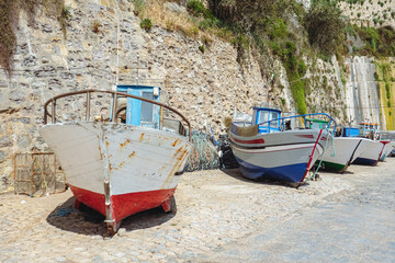 Traditional colorful fishing boats in Ericeira Portugal