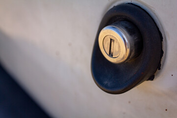 close up of a car's rear door lock handle