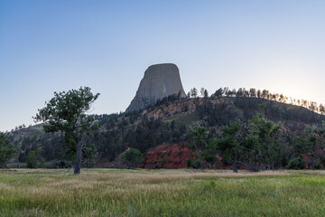 view of devils tower at sunset